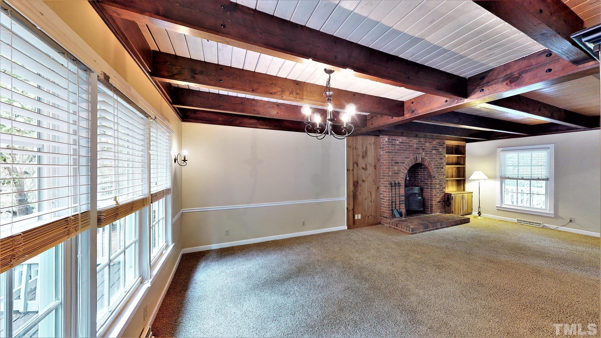 1496 Kerner Road Kernersville, NC 27284 - Photo 10 of 82 a view of an empty room with a fireplace