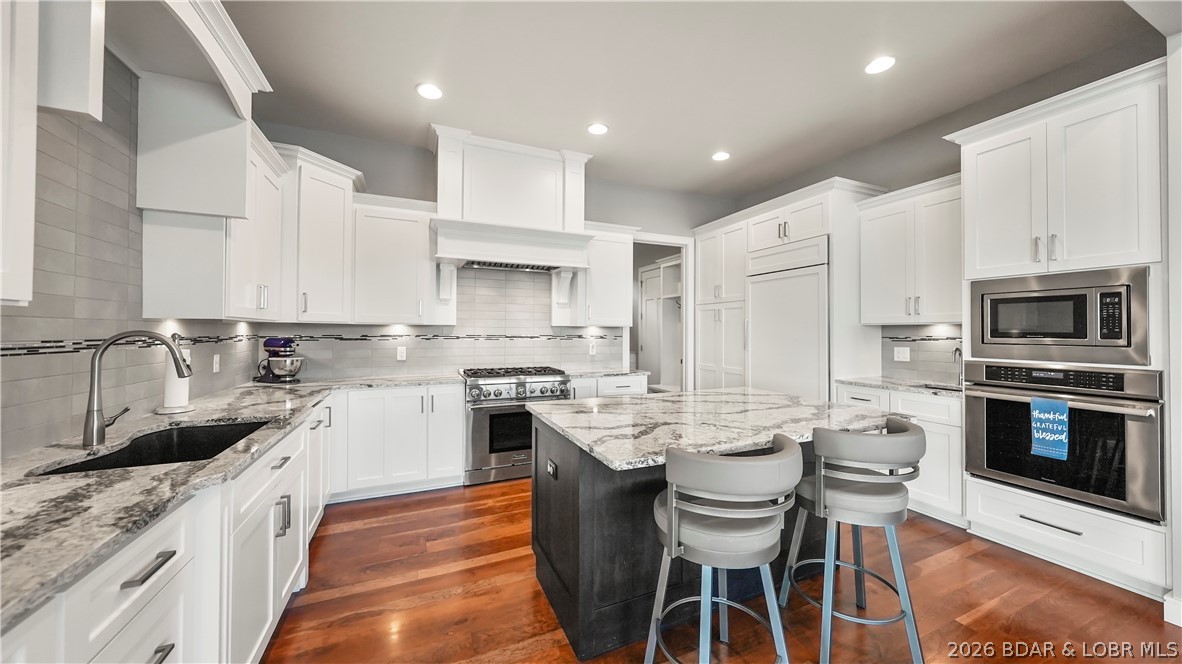 777 Malibu Road Osage Beach, MO 65065 - Photo 34 of 100 You will love this fresh, white kitchen gleaming w