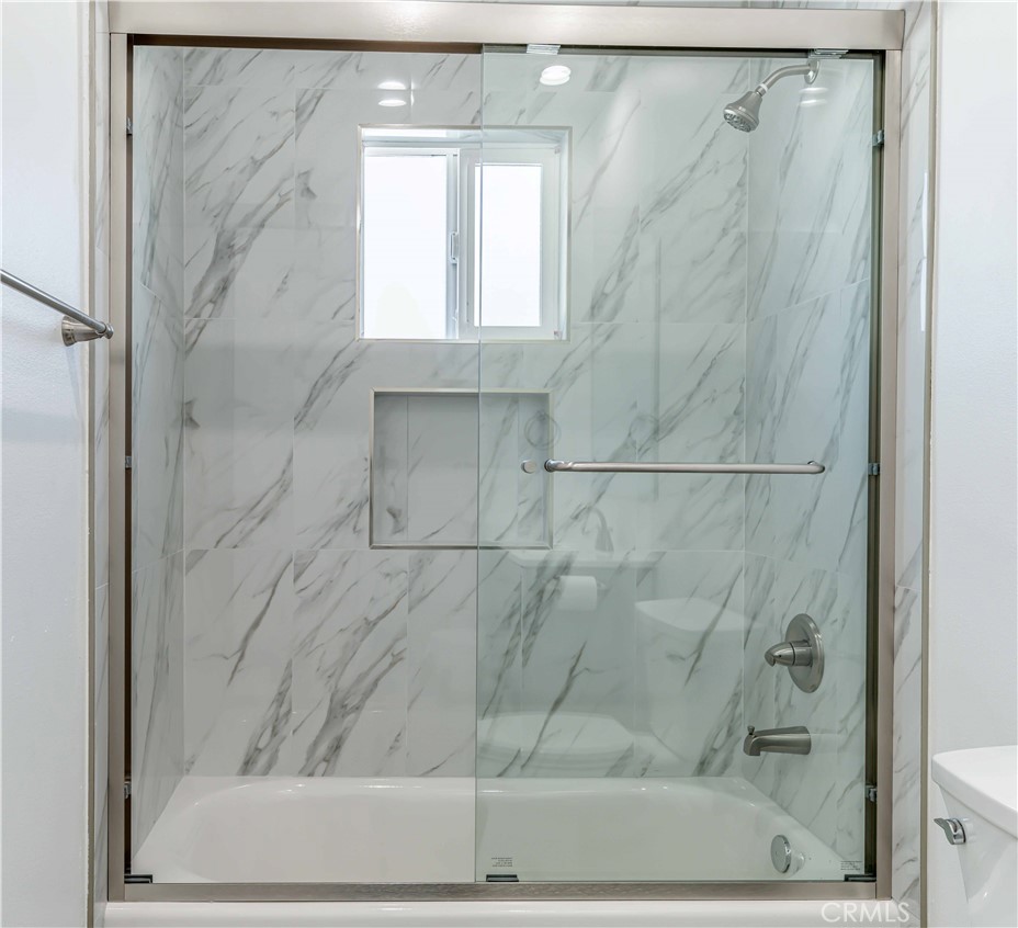 12615 George Street Garden Grove, CA 92840 - Photo 16 of 24 a bathroom with a shower