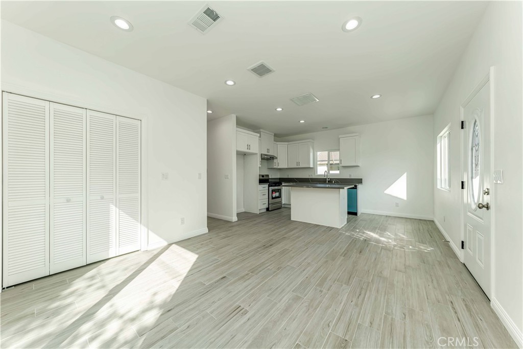 12615 George Street Garden Grove, CA 92840 - Photo 4 of 24 a view of kitchen with wooden floor