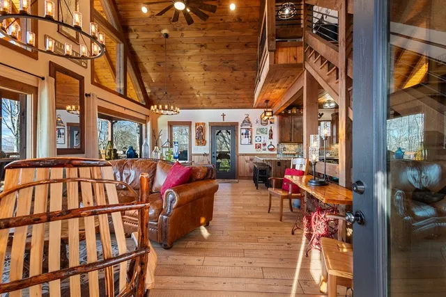 a kitchen view of a table and chairs