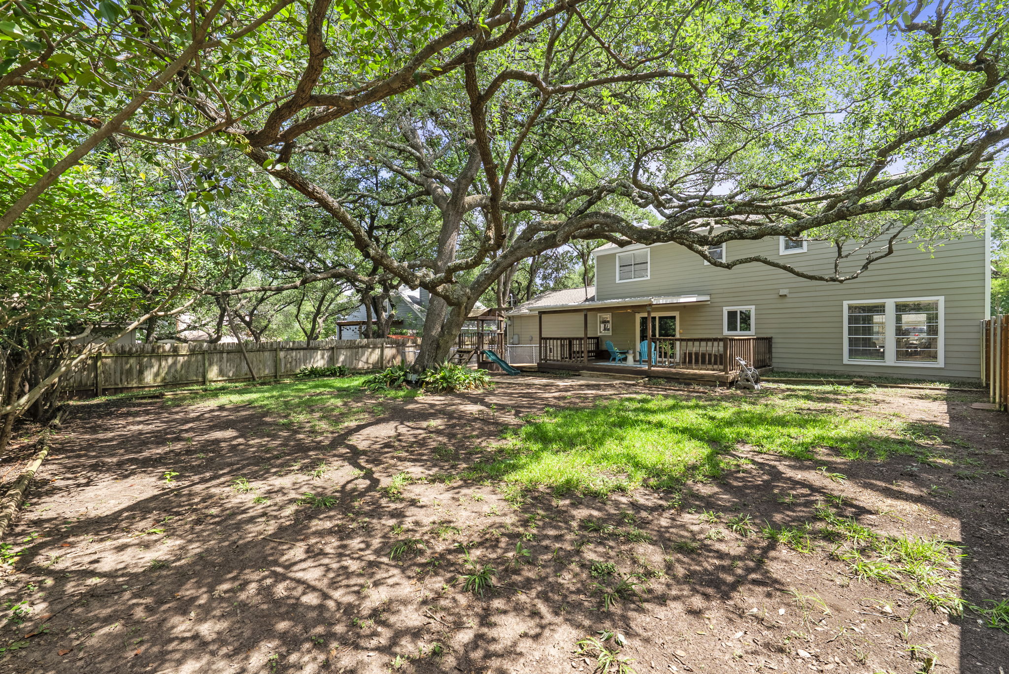 11405 Pyreneese Drive Austin, TX 78759 - Photo 28 of 37 a front view of a house with a garden