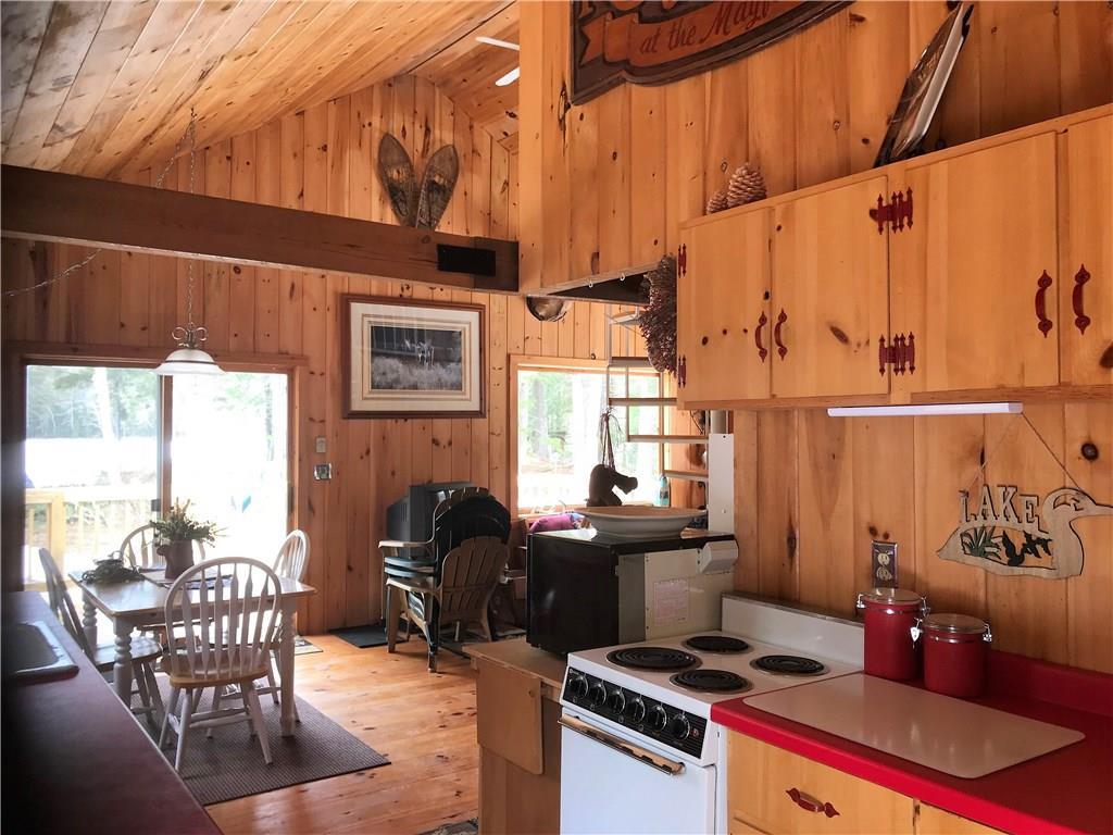 572 Springy Pond Road Otis, ME 04605 - Photo 6 of 18 Kitchen and living area in main...