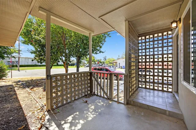 a view of a balcony and an outdoor space
