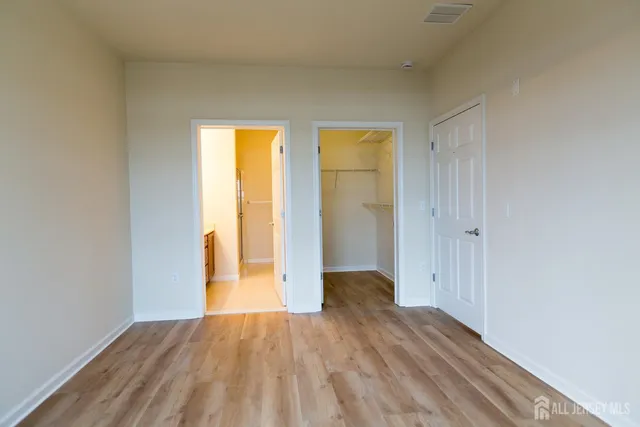 a view of wooden floor in an empty room