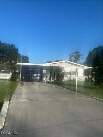 a view of swimming pool from a yard