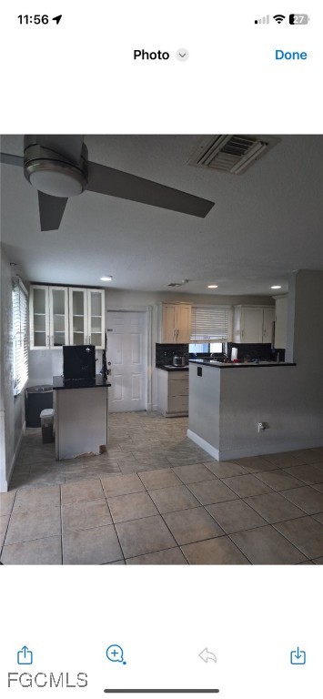 114 Oleander Road Lehigh Acres, FL 33936 - Photo 15 of 17 a view of living room with furniture and wooden floor
