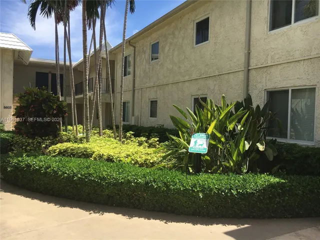 a view of a house with swimming pool