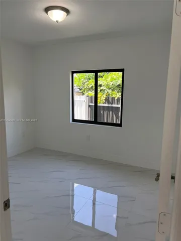 a bathroom with a sink a toilet and bathtub