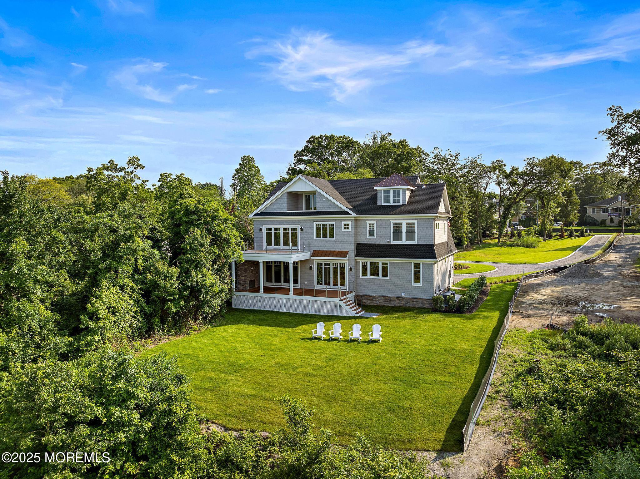 1604 Marconi Road Wall, NJ 07719 - Photo 13 of 69 an aerial view of a house with a big yard