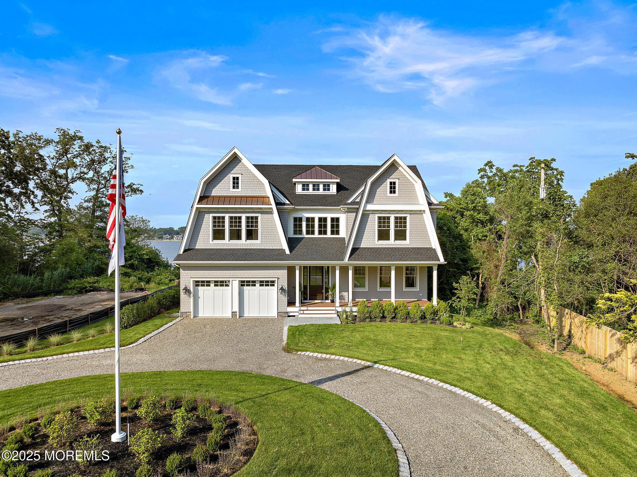 1604 Marconi Road Wall, NJ 07719 - Photo 14 of 69 a front view of a house with a yard