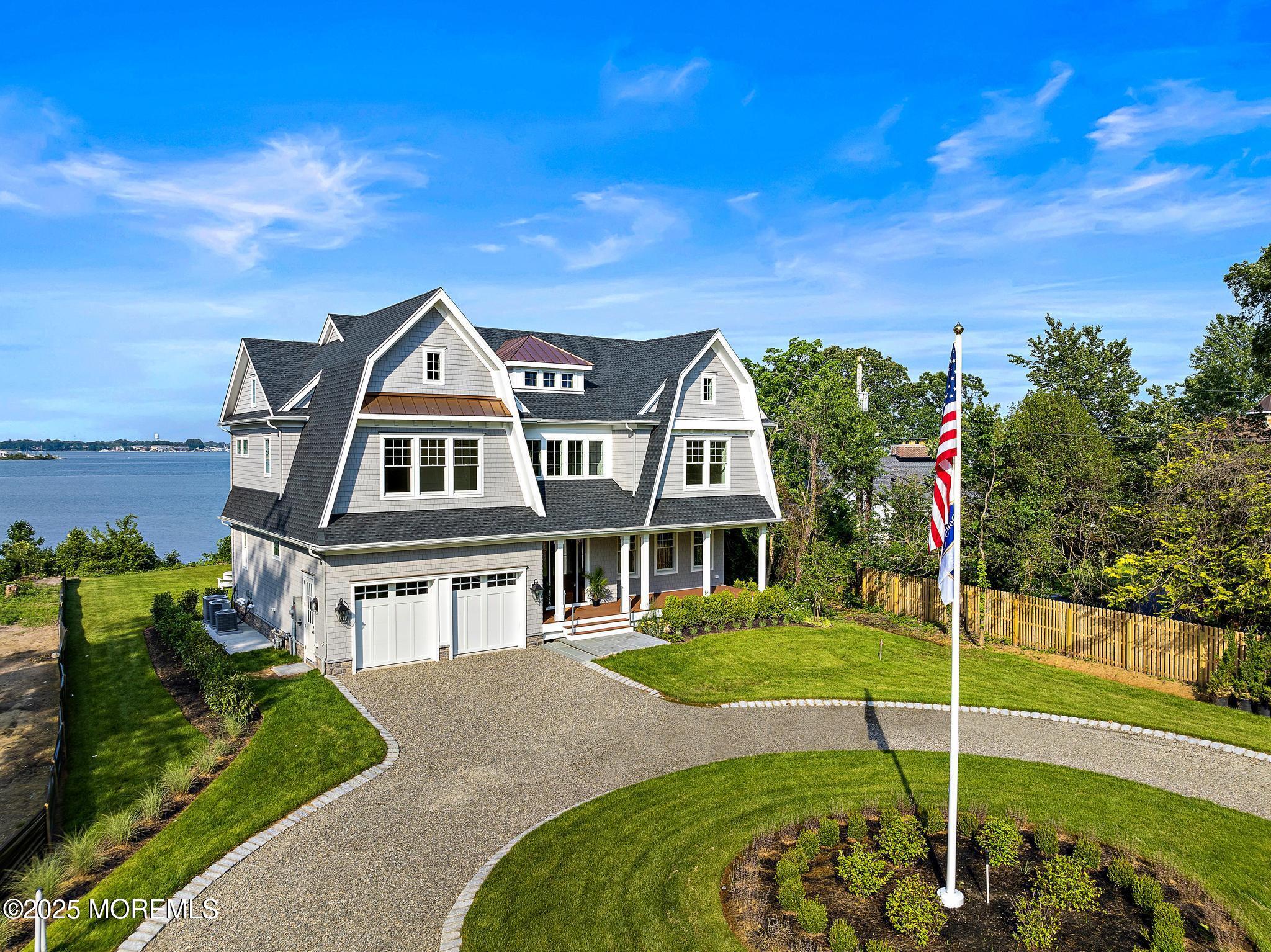 1604 Marconi Road Wall, NJ 07719 - Photo 2 of 69 a front view of a house with a yard