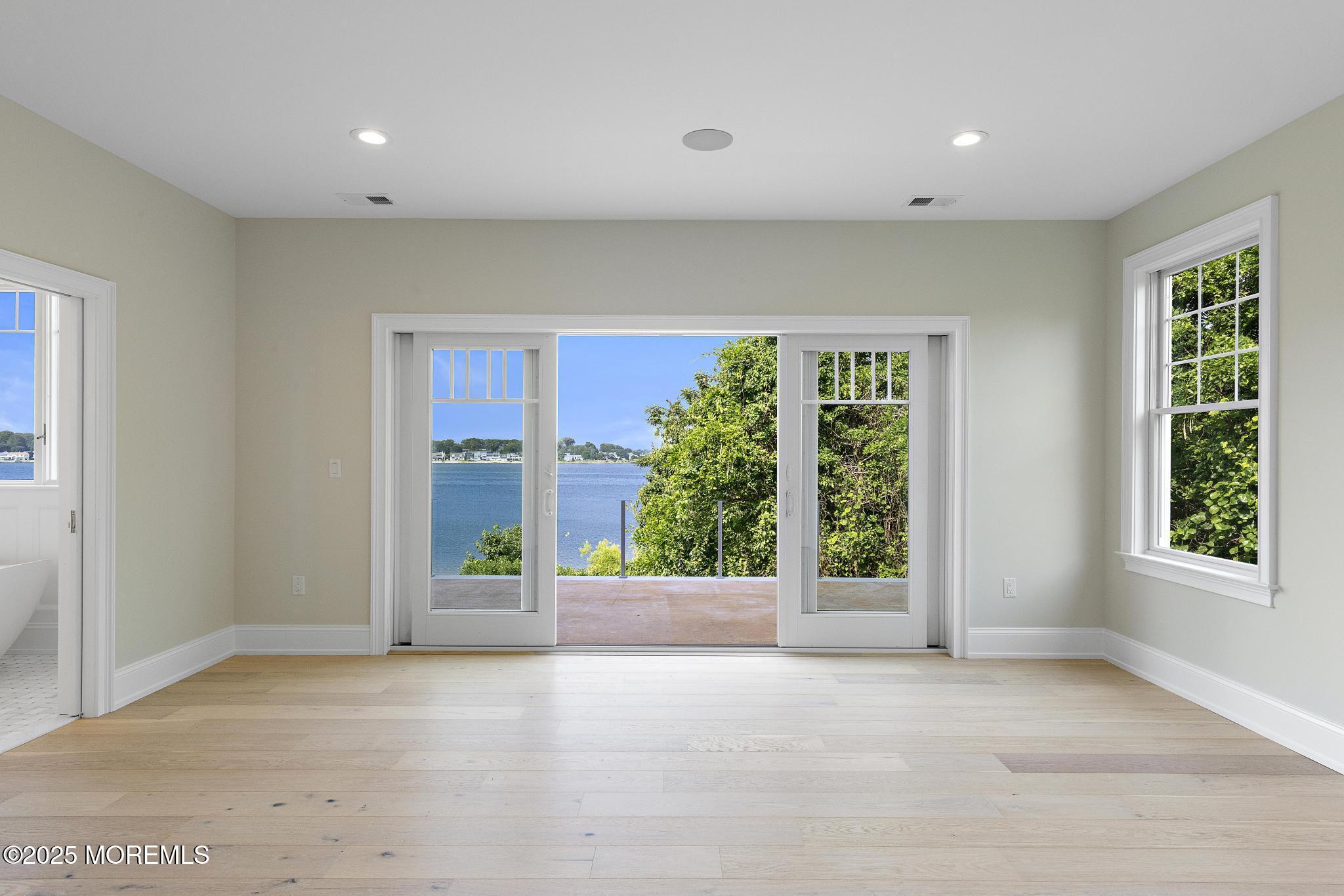 1604 Marconi Road Wall, NJ 07719 - Photo 41 of 69 a view of an empty room with a window and front door