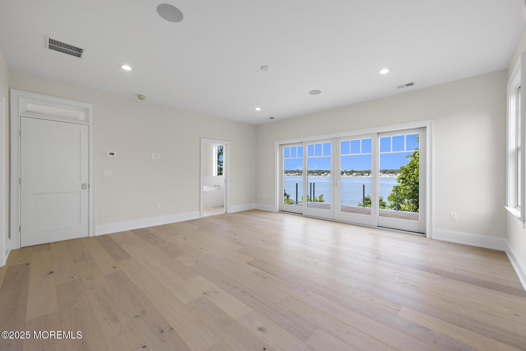 1604 Marconi Road Wall, NJ 07719 - Photo 42 of 69 a view of a livingroom with wooden floor and a large window