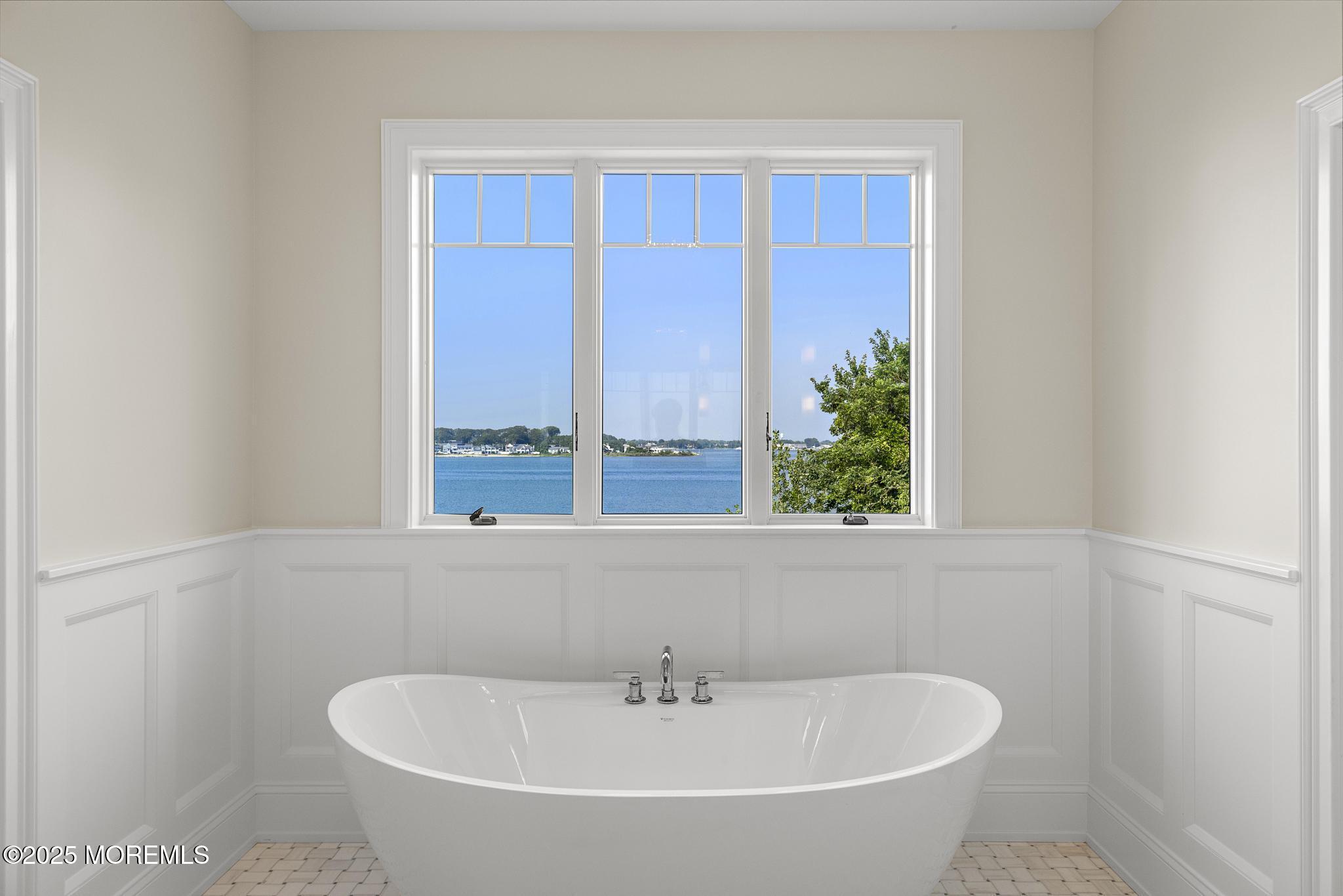 1604 Marconi Road Wall, NJ 07719 - Photo 47 of 69 a white bath tub sitting next to a window