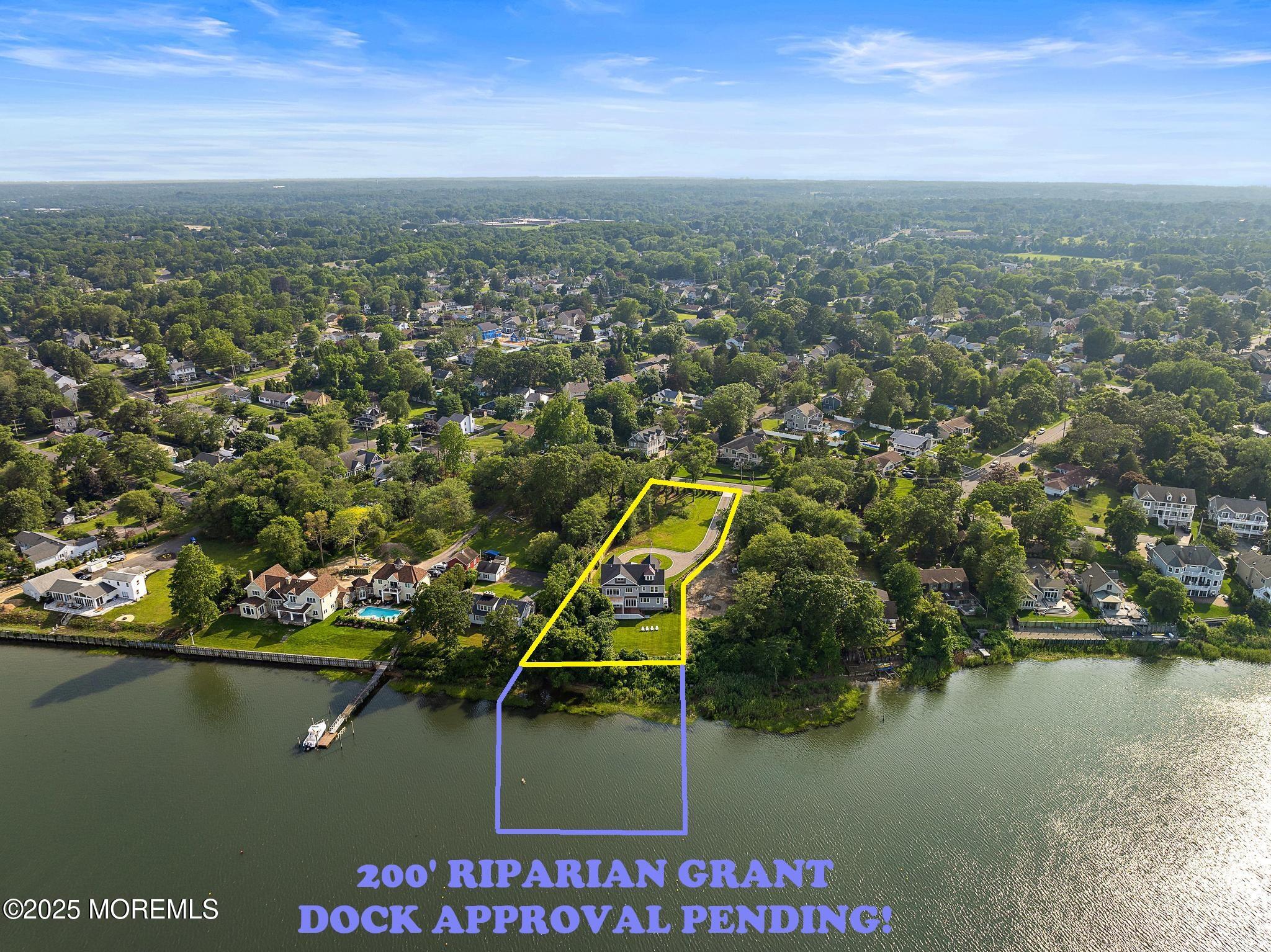 1604 Marconi Road Wall, NJ 07719 - Photo 6 of 69 an aerial view of residential houses with outdoor space and lake view