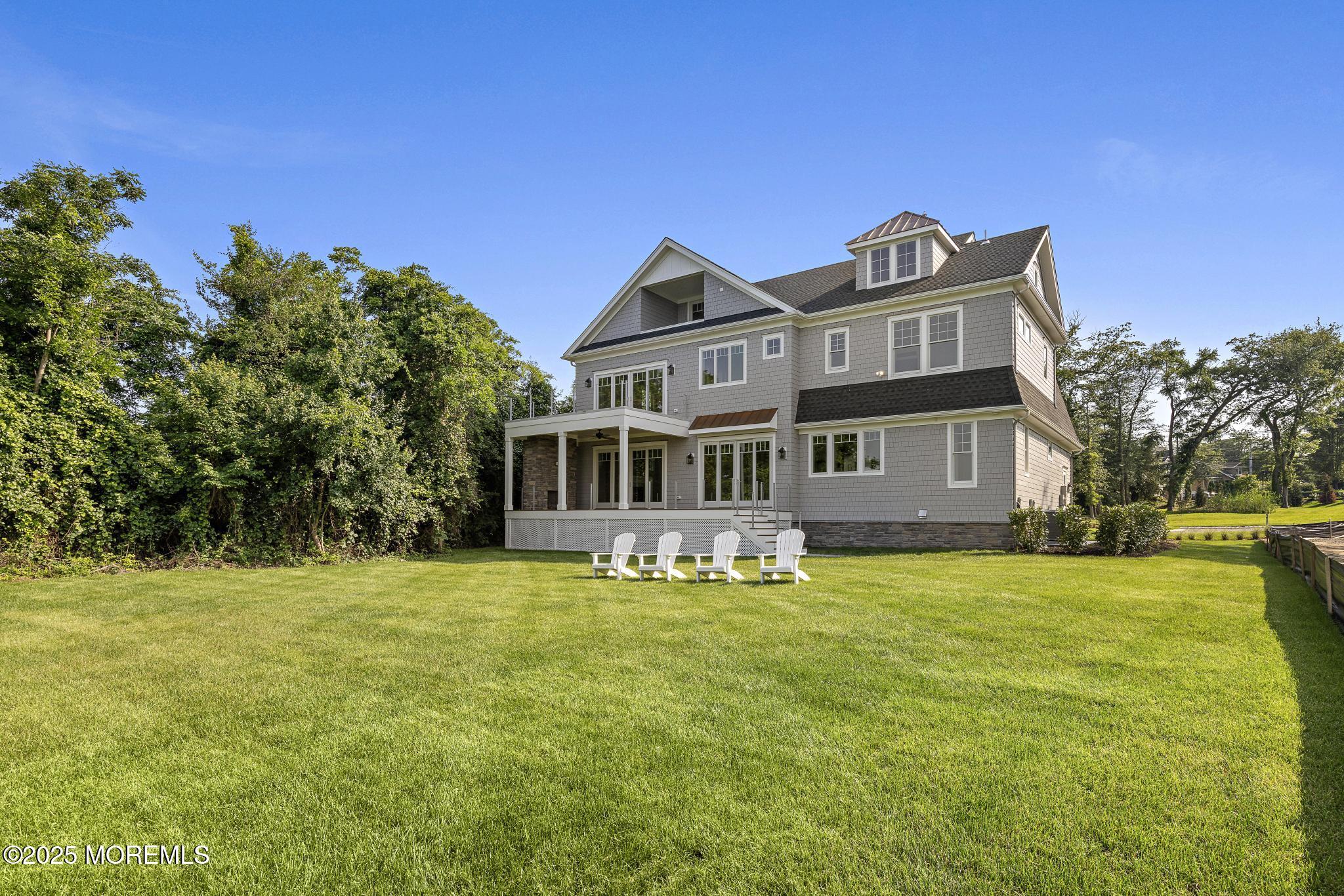 1604 Marconi Road Wall, NJ 07719 - Photo 63 of 69 a front view of a house with a garden