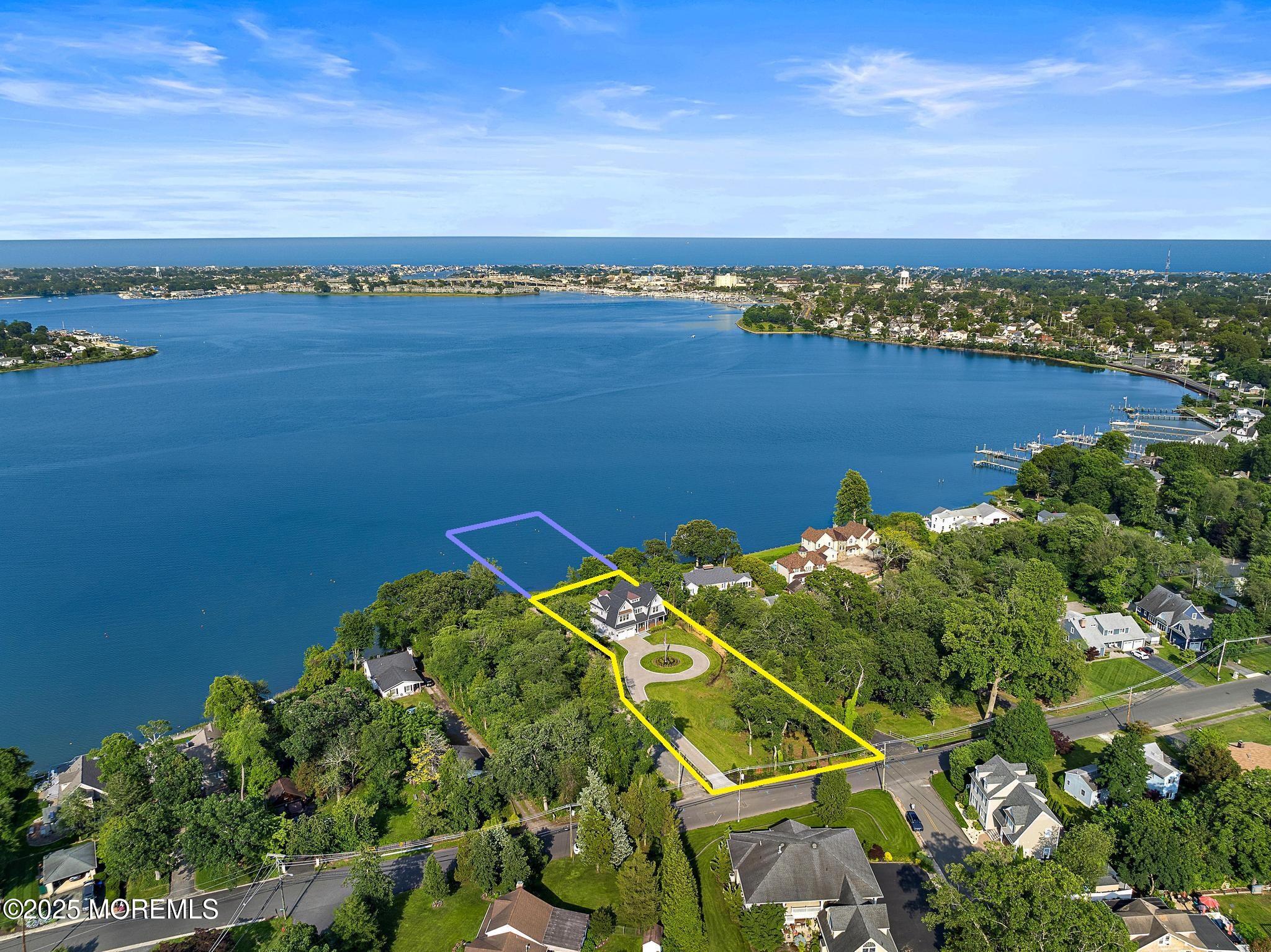 1604 Marconi Road Wall, NJ 07719 - Photo 7 of 69 a view of a lake with a city