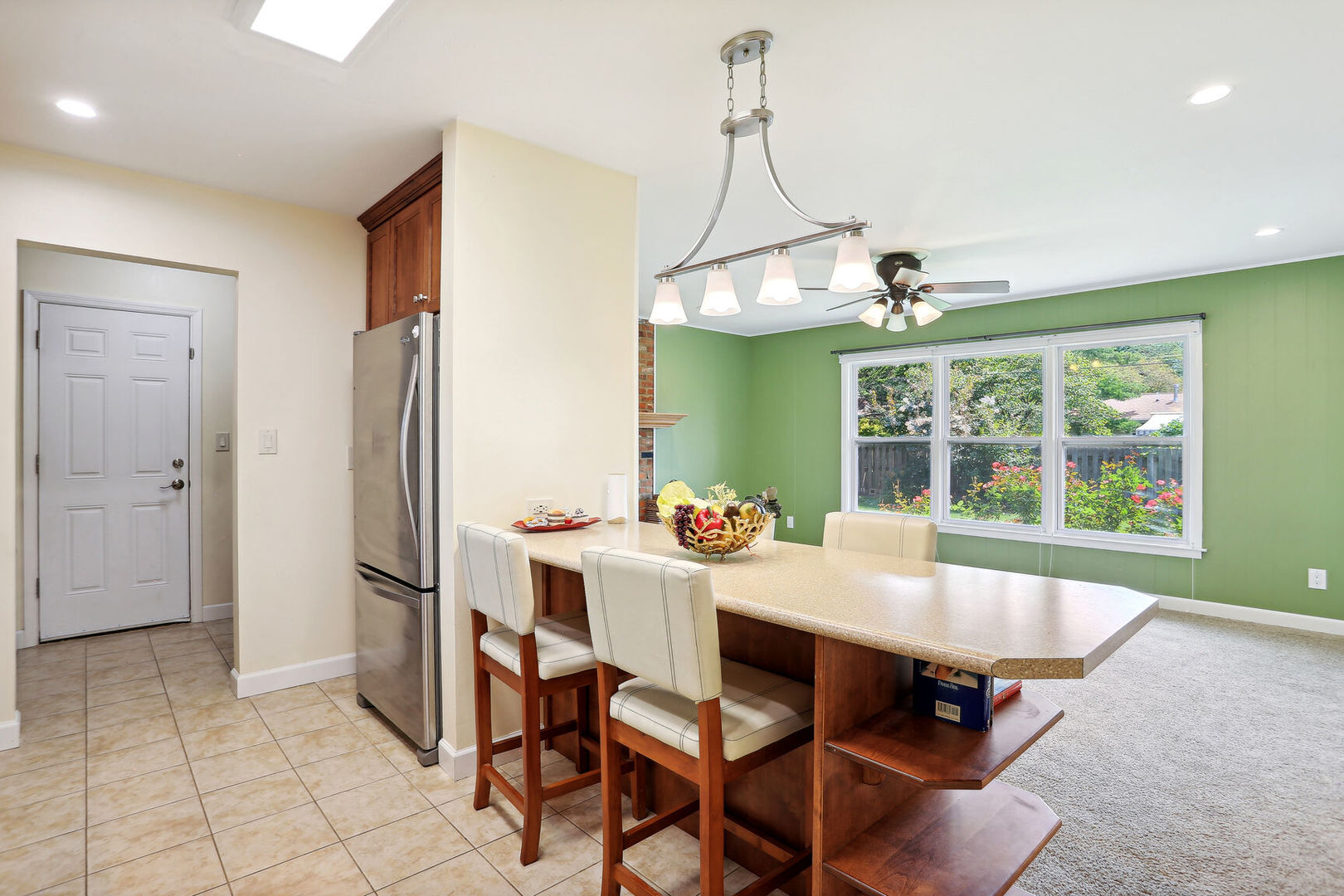 1111 Theodore Drive Champaign, IL 61821 - Photo 15 of 34 a view of a dining room with furniture window and wooden floor