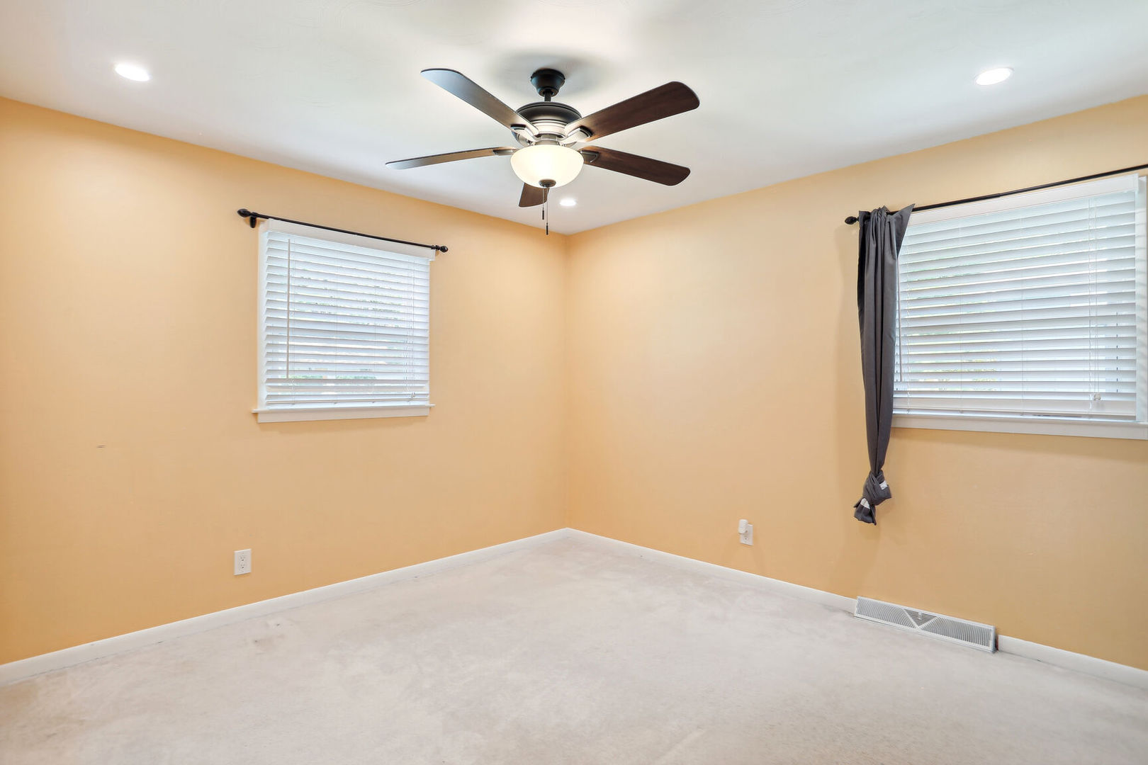 1111 Theodore Drive Champaign, IL 61821 - Photo 18 of 34 an empty room with window and ceiling fan