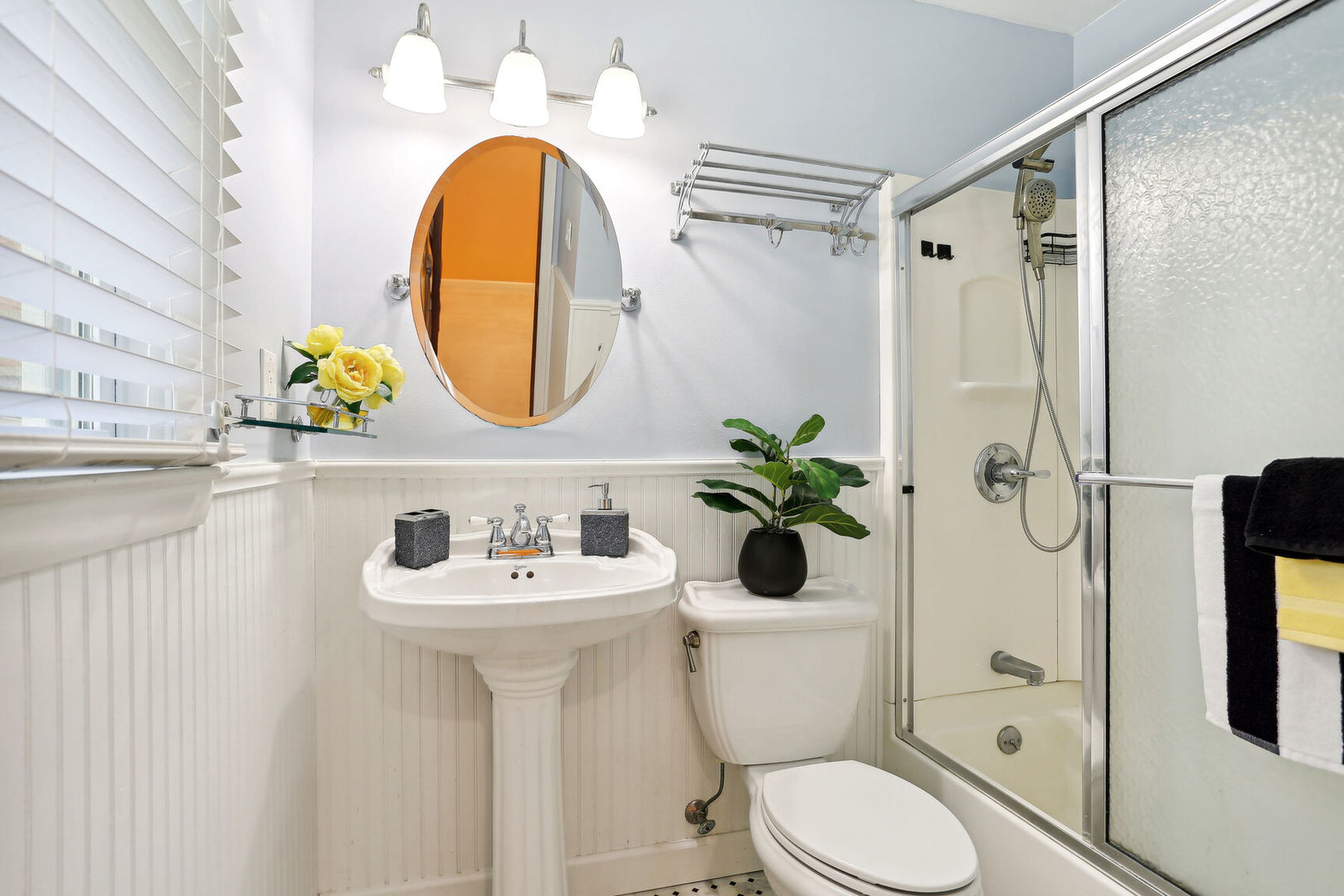 1111 Theodore Drive Champaign, IL 61821 - Photo 20 of 34 a bathroom with a sink mirror toilet and shower