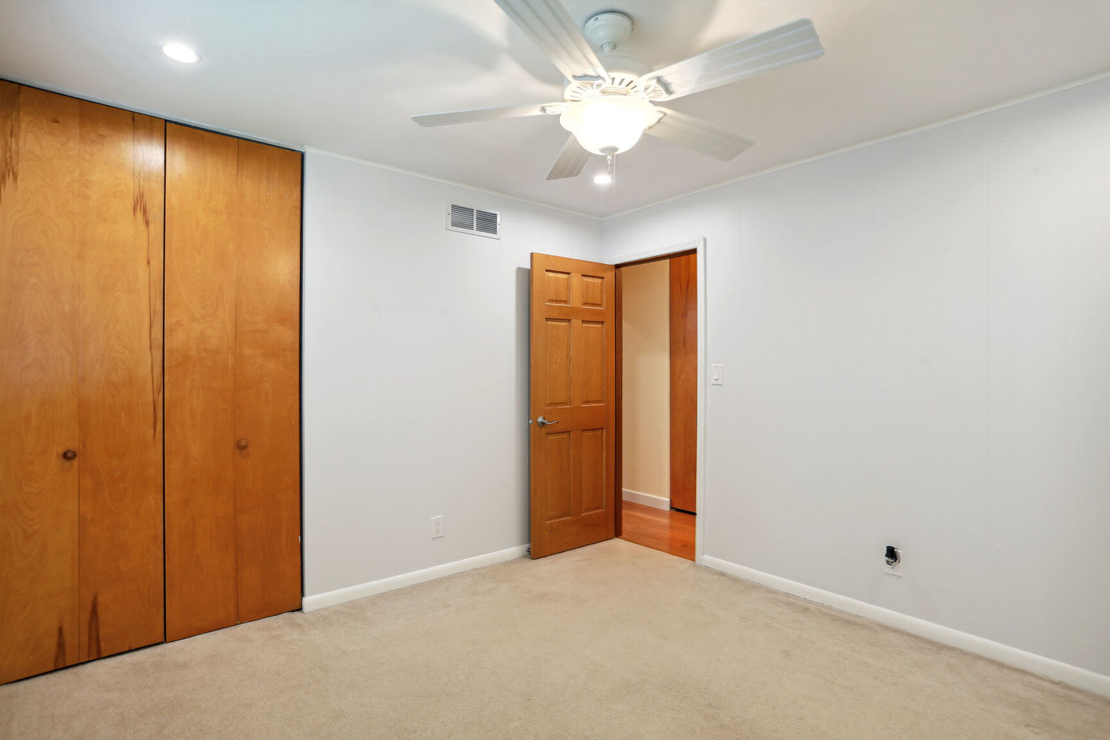 1111 Theodore Drive Champaign, IL 61821 - Photo 22 of 34 a view of an empty room with a chandelier fan