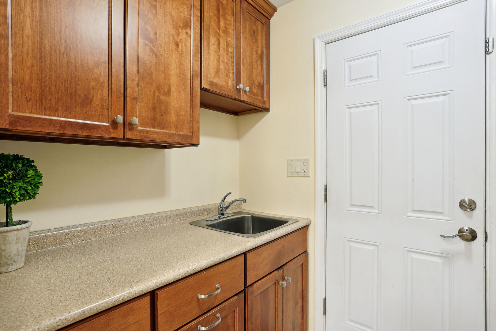 1111 Theodore Drive Champaign, IL 61821 - Photo 27 of 34 a kitchen with a sink and cabinets