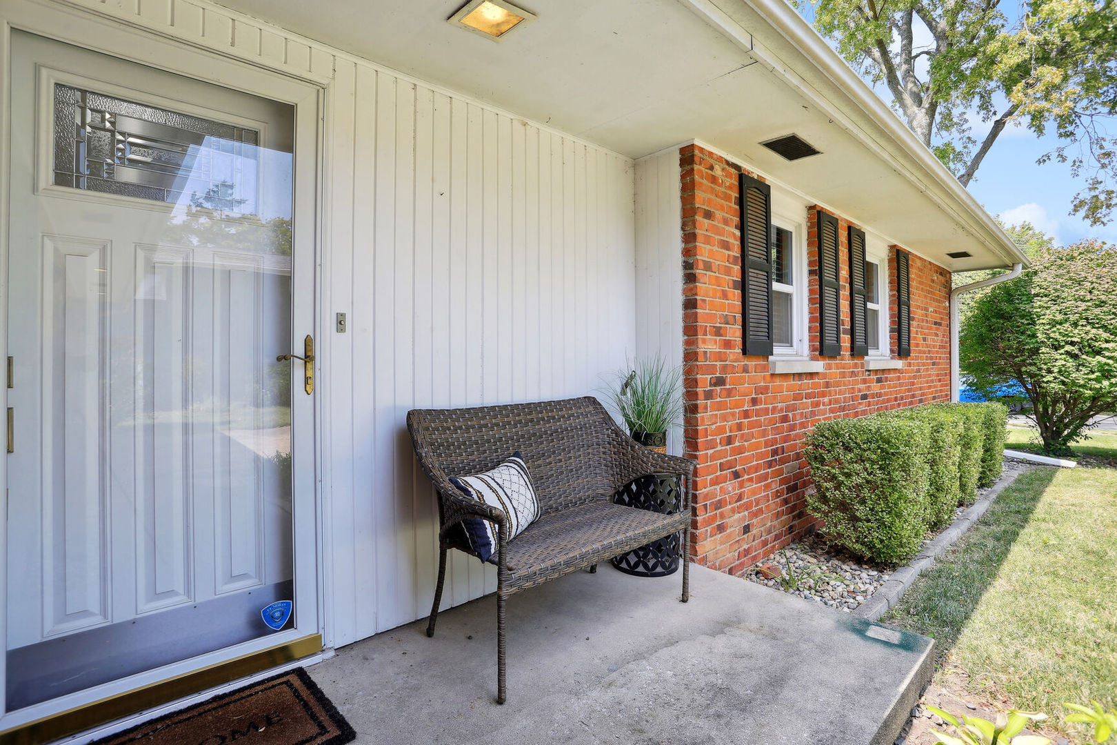 1111 Theodore Drive Champaign, IL 61821 - Photo 5 of 34 a view of a patio with a table and chairs and potted plants