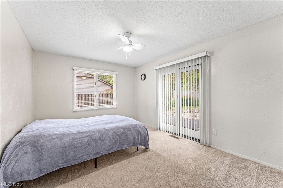 5165 North Barton Road North Ridgeville, OH 44039 - Photo 26 of 35 Primary suite, slider to deck.