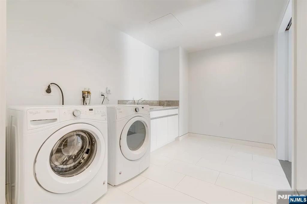 320 Adolphus Avenue, Unit 1415 Cliffside Park, NJ 07010 - Photo 13 of 35 a utility room with dryer and washer