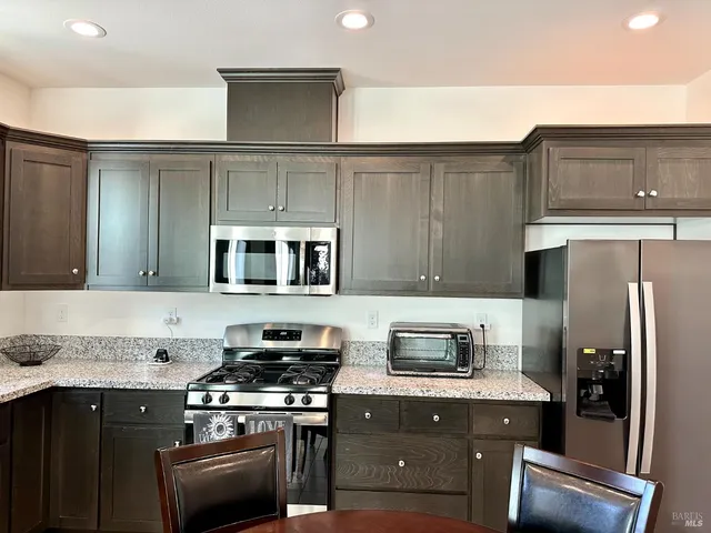 a bathroom with a shower and a sink