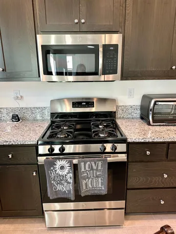 a view of a hallway with closet and entryway