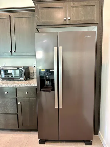 a view of staircase with white walls and railing