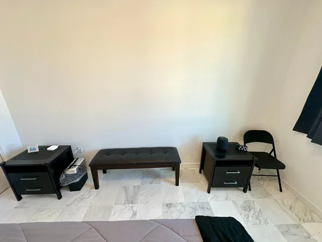 a bathroom with a sink vanity and a mirror