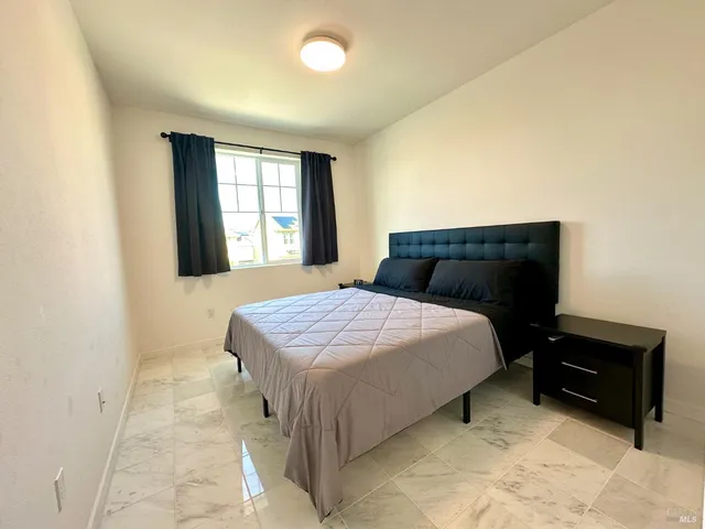 a view of washer and dryer in a utility room