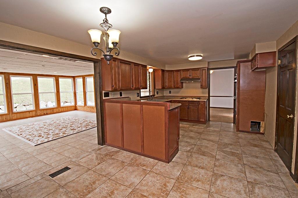 440 Markle Road Apollo, PA 15613 - Photo 13 of 25 Almost ONE great room ! From the kitchen into the fabulous sun room/all season room!