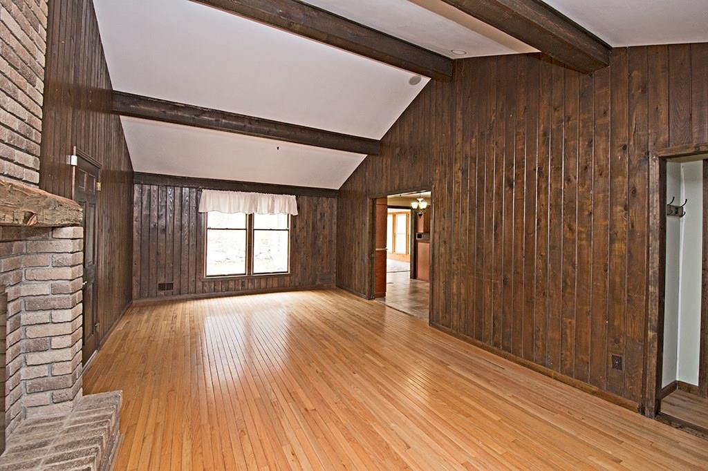 440 Markle Road Apollo, PA 15613 - Photo 16 of 25 Cozy, inviting, relaxing. The family room with it's vaulted beamed ceiling, gas fireplace, wood flooring and gorgeous knotty pine walls !