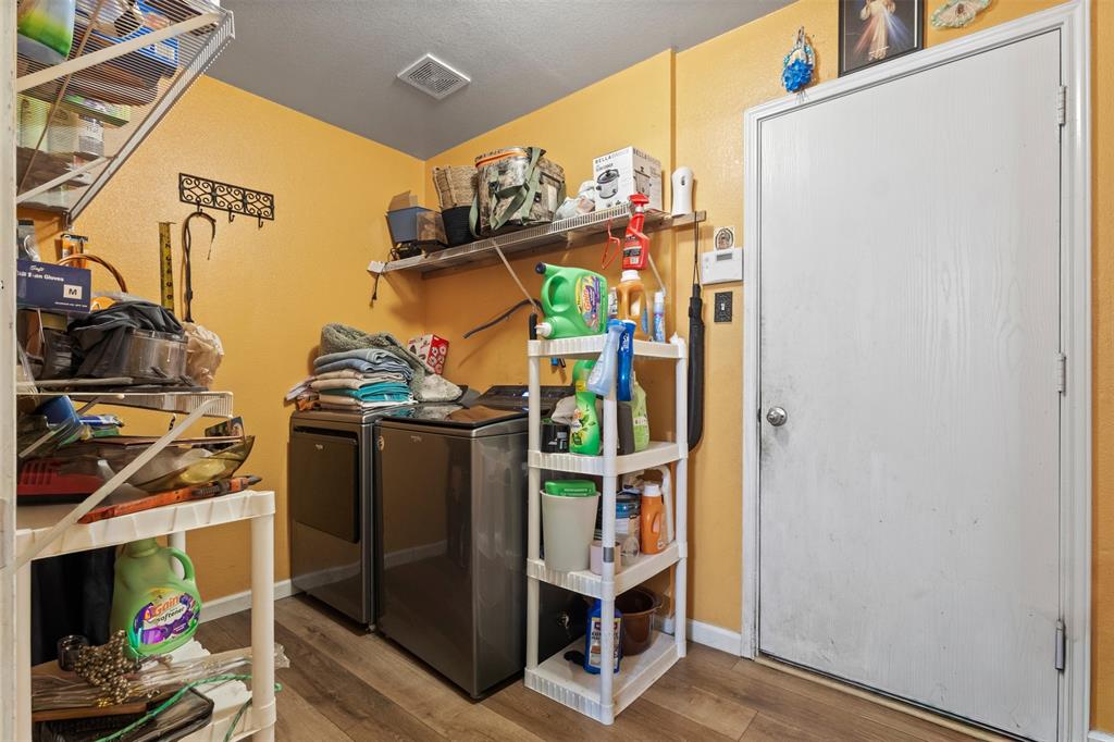 1034 Hollow Oak Road Lancaster, TX 75134 - Photo 12 of 29 a view of storage and utility room