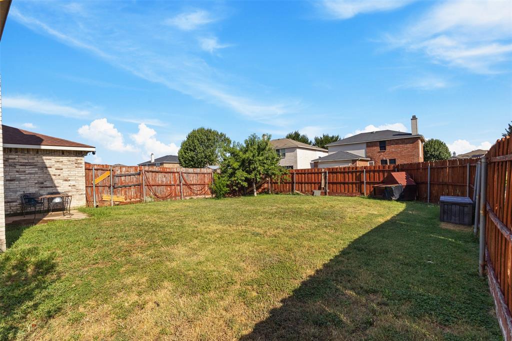1034 Hollow Oak Road Lancaster, TX 75134 - Photo 27 of 29 a view of a garden