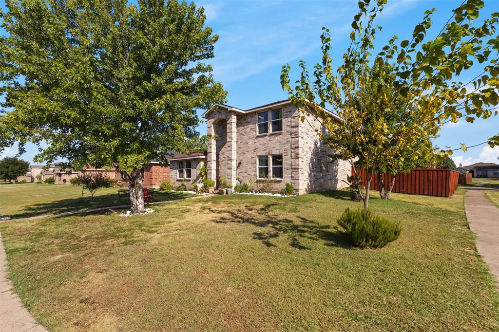 1034 Hollow Oak Road Lancaster, TX 75134 - Photo 3 of 29 a view of a house with a yard