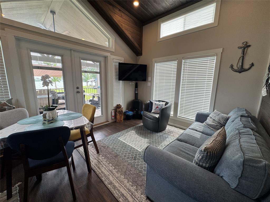 5000 Waterfront Road, Unit 126 Kerens, TX 75144 - Photo 16 of 28 a living room with furniture and a large window