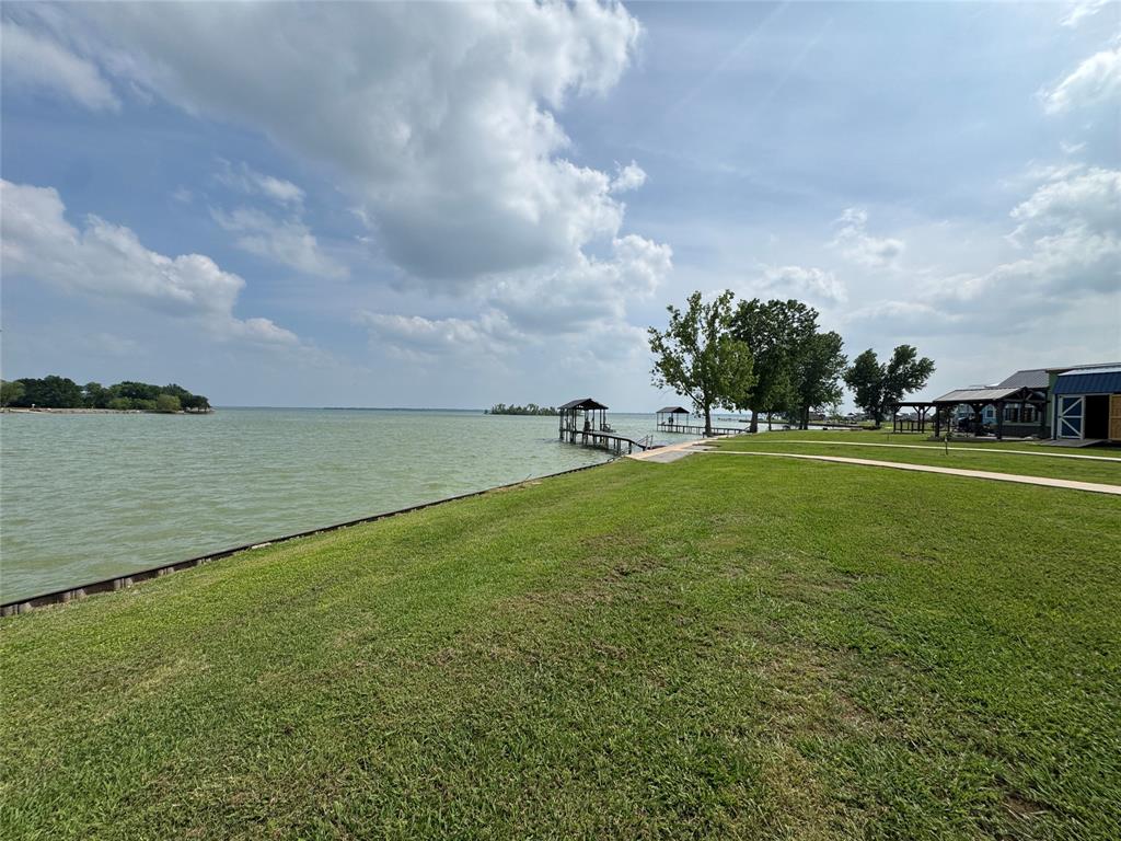 5000 Waterfront Road, Unit 126 Kerens, TX 75144 - Photo 6 of 28 a view of building with ocean view