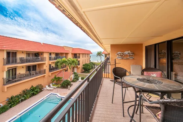 $899,000 | 6006 Gulf Drive, Unit 207, Holmes Beach, FL 34217