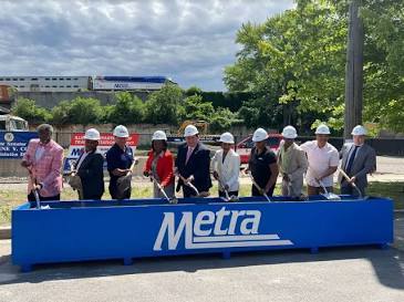 237 West 79th Street Chicago, IL 60620 - Photo 3 of 7 a view of group of people sitting on a street