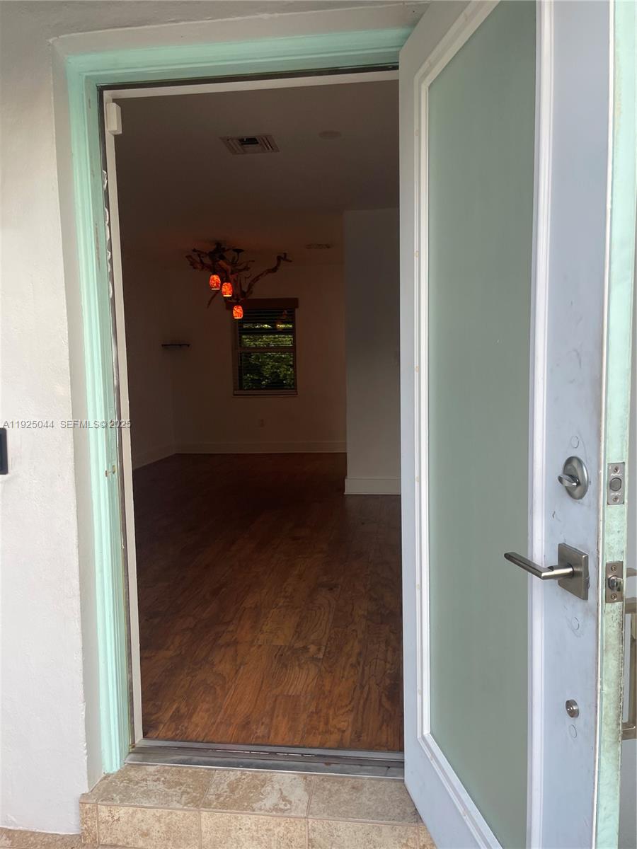 705 East 9th Court Hialeah, FL 33010 - Photo 2 of 36 a view of a hallway