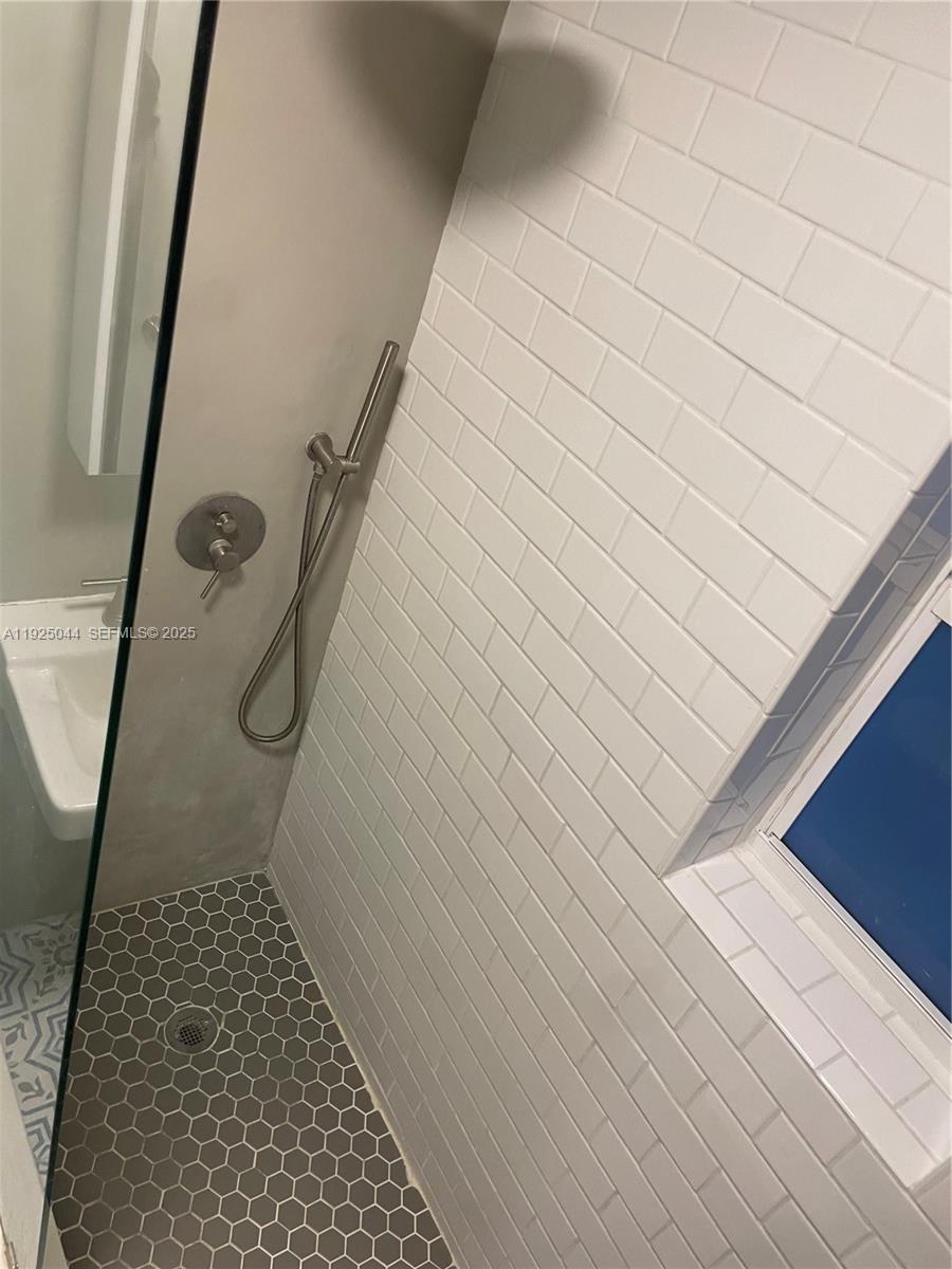 705 East 9th Court Hialeah, FL 33010 - Photo 25 of 36 a bathroom with a shower