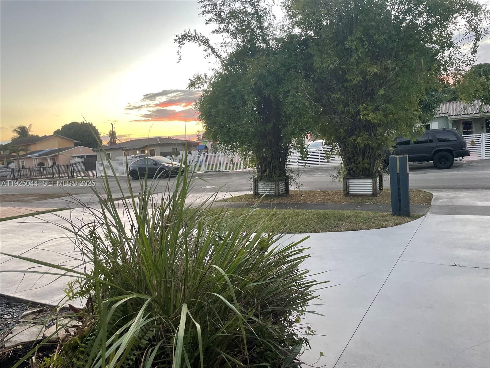 705 East 9th Court Hialeah, FL 33010 - Photo 35 of 36 a view of a backyard with sitting area
