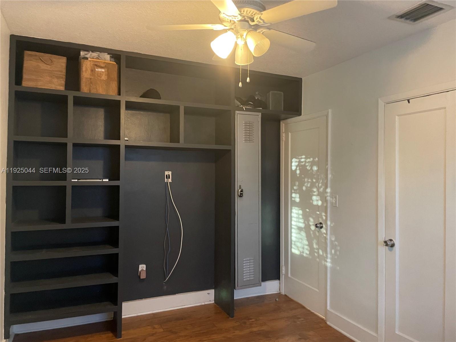 705 East 9th Court Hialeah, FL 33010 - Photo 8 of 36 a view of a livingroom with a staircase