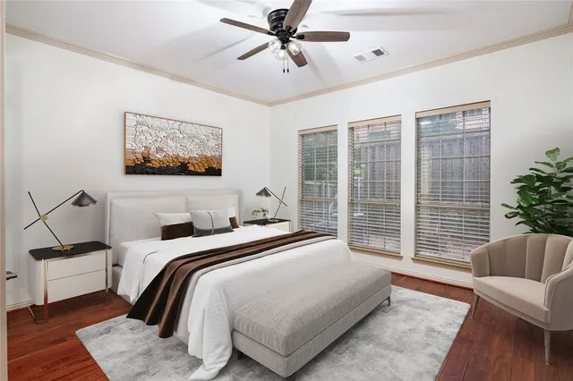 a bedroom with a balcony a bed and a couch