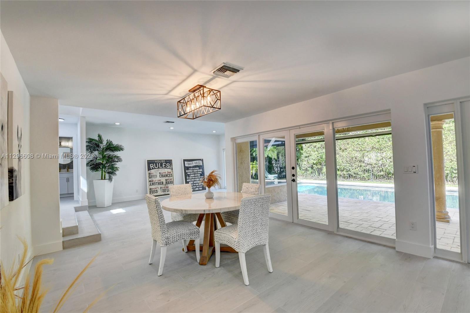 2875 Northwest 28th Street Boca Raton, FL 33434 - Photo 30 of 32 a view of a dining room with furniture window and outside view
